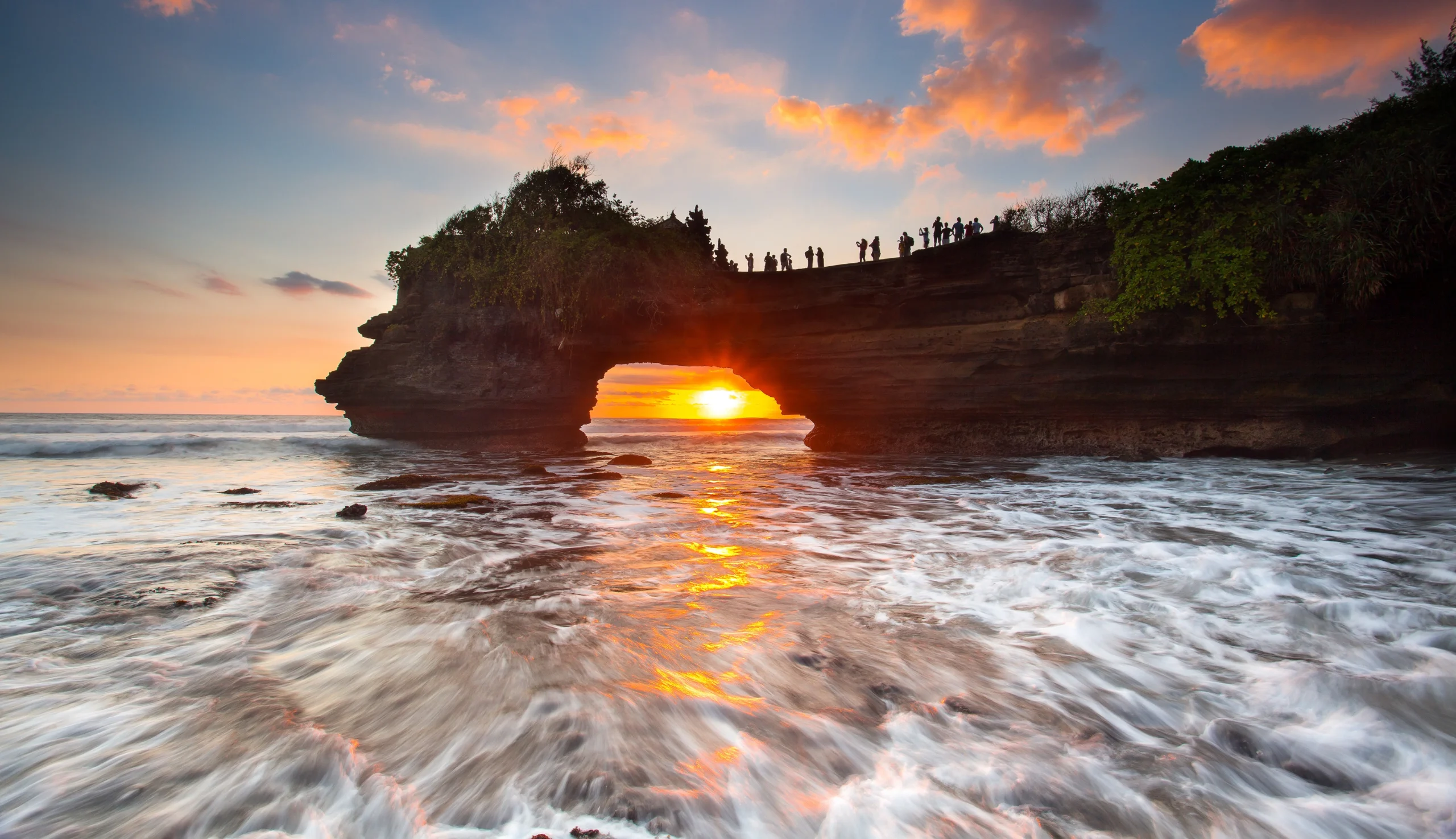 Yeh Gangga Beach black sand coastline with waves in Bali