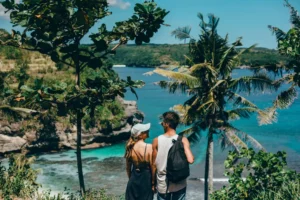 Beautiful young couple posing on the sea and beach love